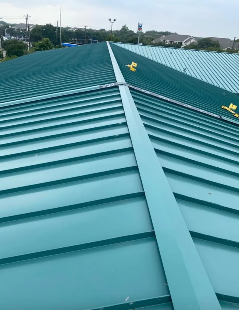 Green commercial metal roof ridge and valley for Metal Roof Repair in Atlantic Beach