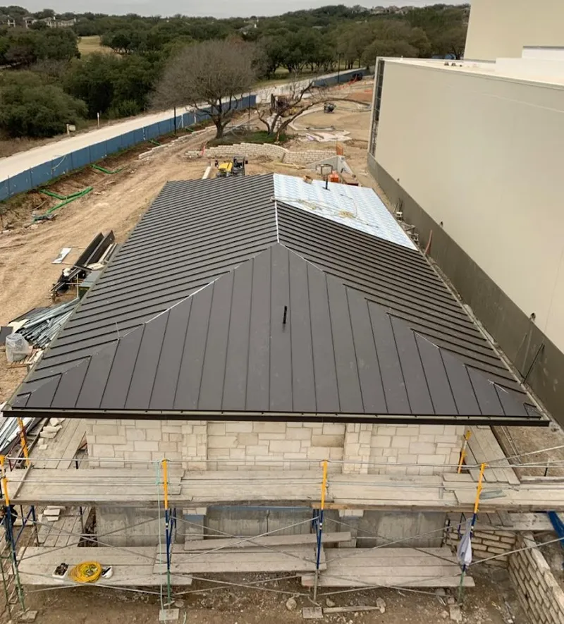 Metal roof new construction with scaffolding in Atlantic Beach